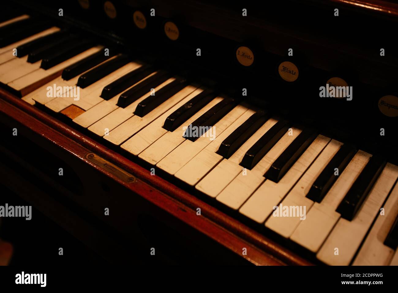 Old vintage harmonium piano keyboard. Close up view Stock Photo