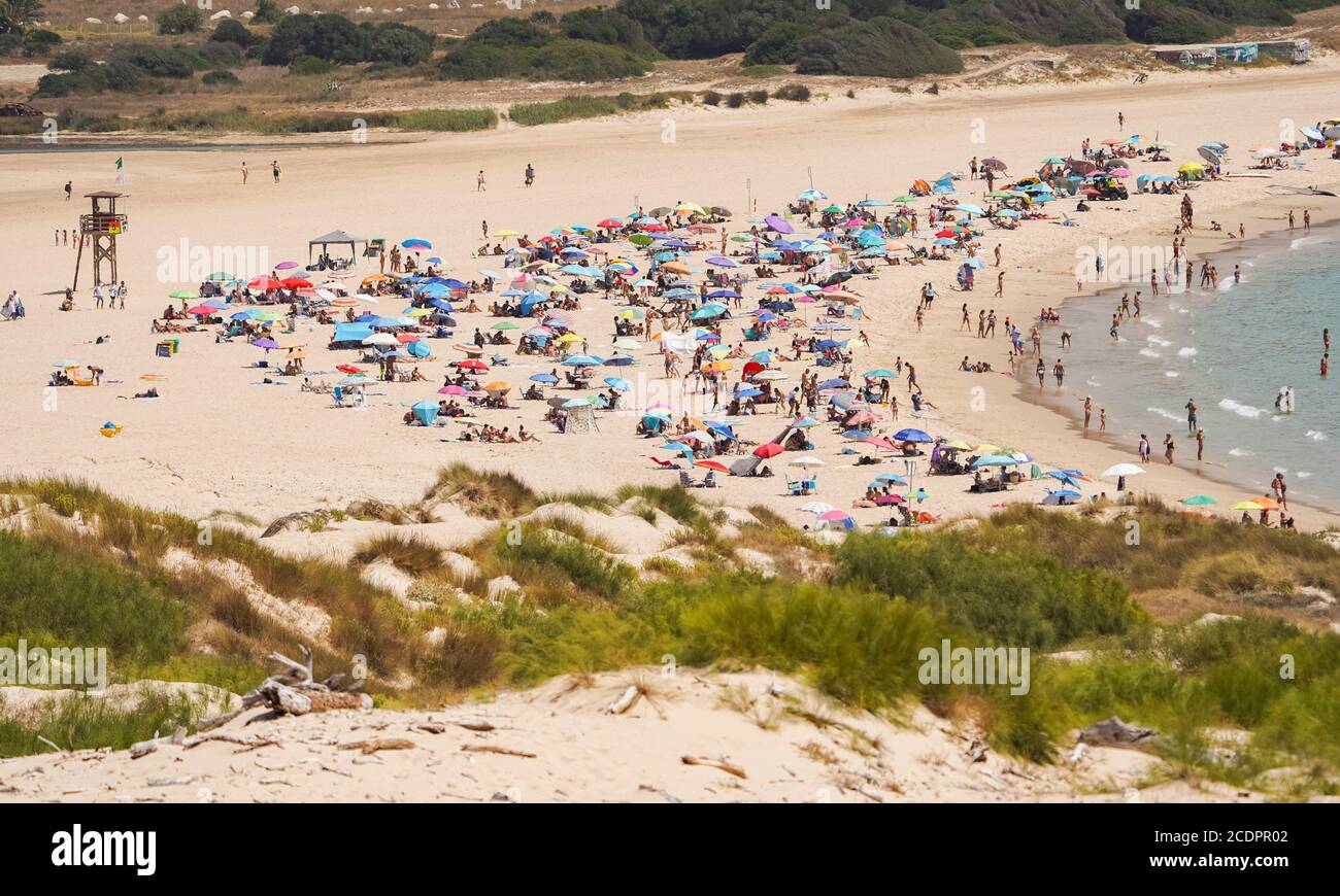 Busy beach in summer at Valdevaqueros, Cadiz Province, Costa de la Luz, Andalucia, Spain Stock Photo