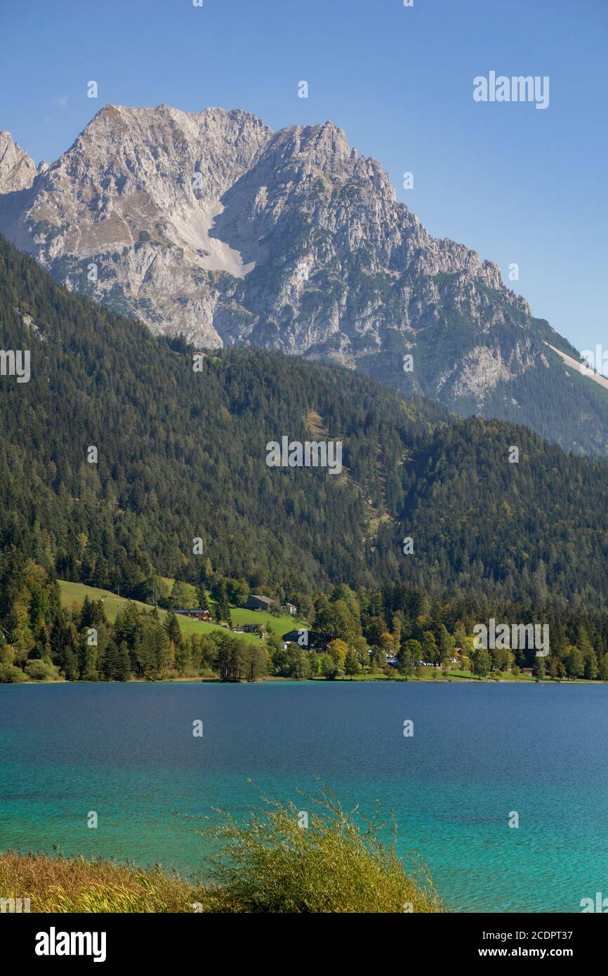 Beautiful lake at the base of the Alps Stock Photo