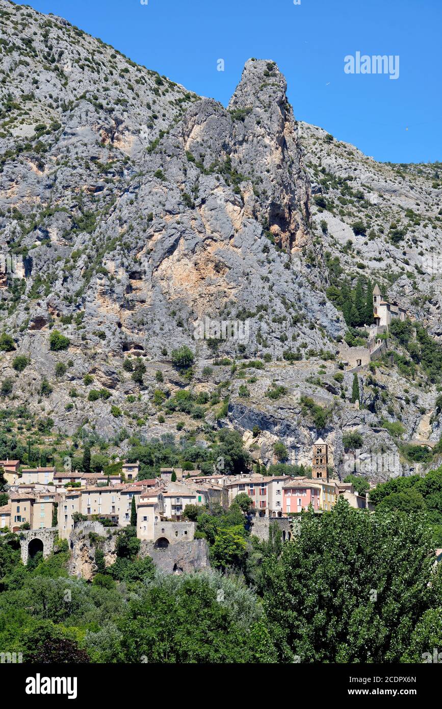 Moustiers-Sainte-Marie at the foot of the mountain,commune in the Alpes-de-Haute-Provence department in southeastern France Stock Photo