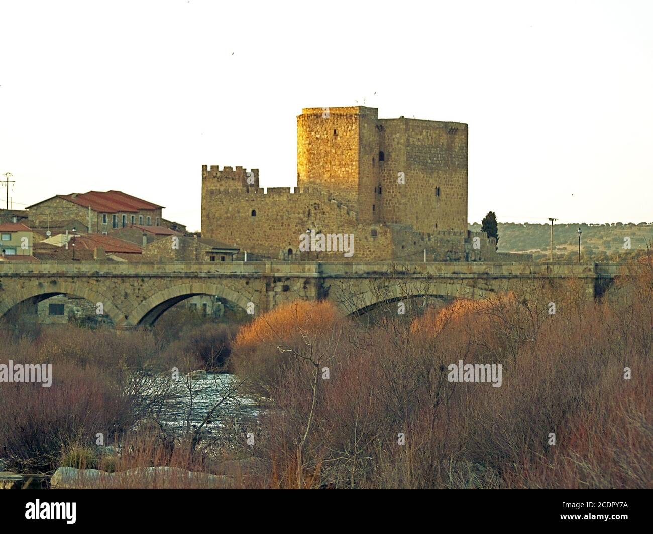 Castle and stone bridge on a Spanish village Stock Photo
