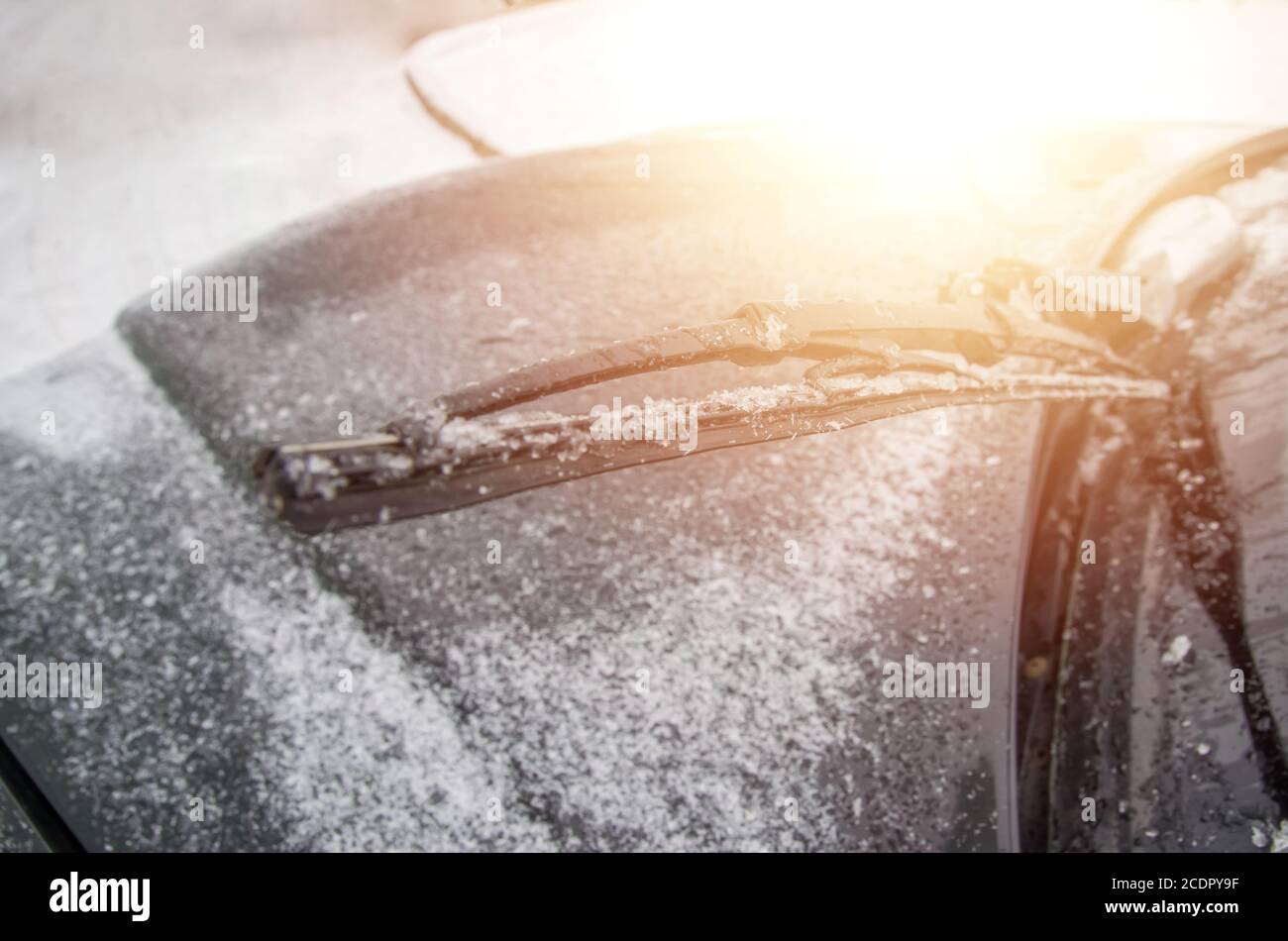 Car wipers covered with ice. Close-up Stock Photo