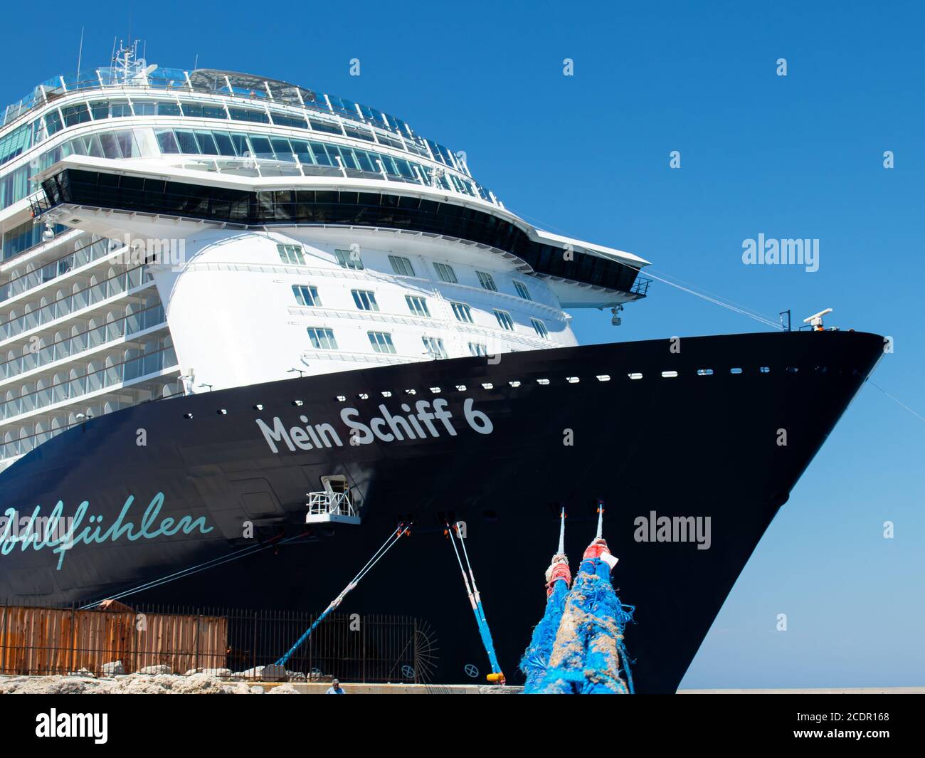 Rhodes, Greece - July 3, 2019 - Side view of the cruise ship of the TUI Cruises shipping company named 'Mein Schiff 6' moored in the port of Rhodes, G Stock Photo