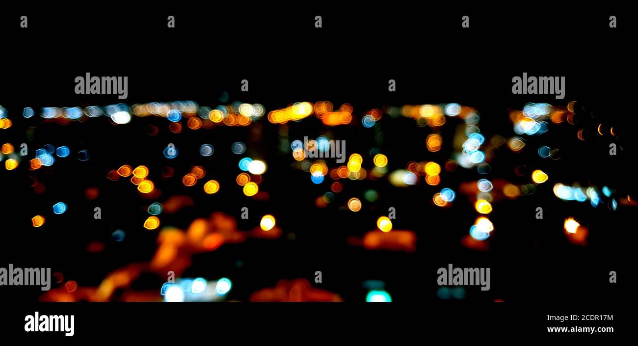 City lights bokeh circles on black Stock Photo - Alamy