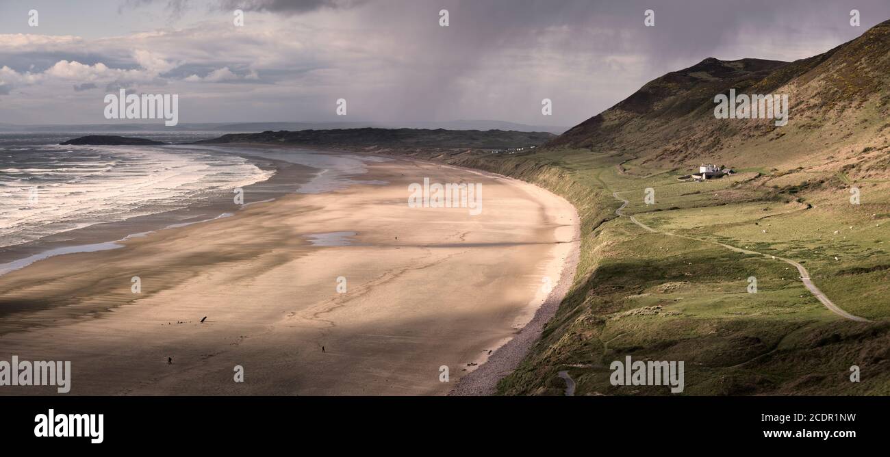 Rossili Bay with rain moving through Stock Photo