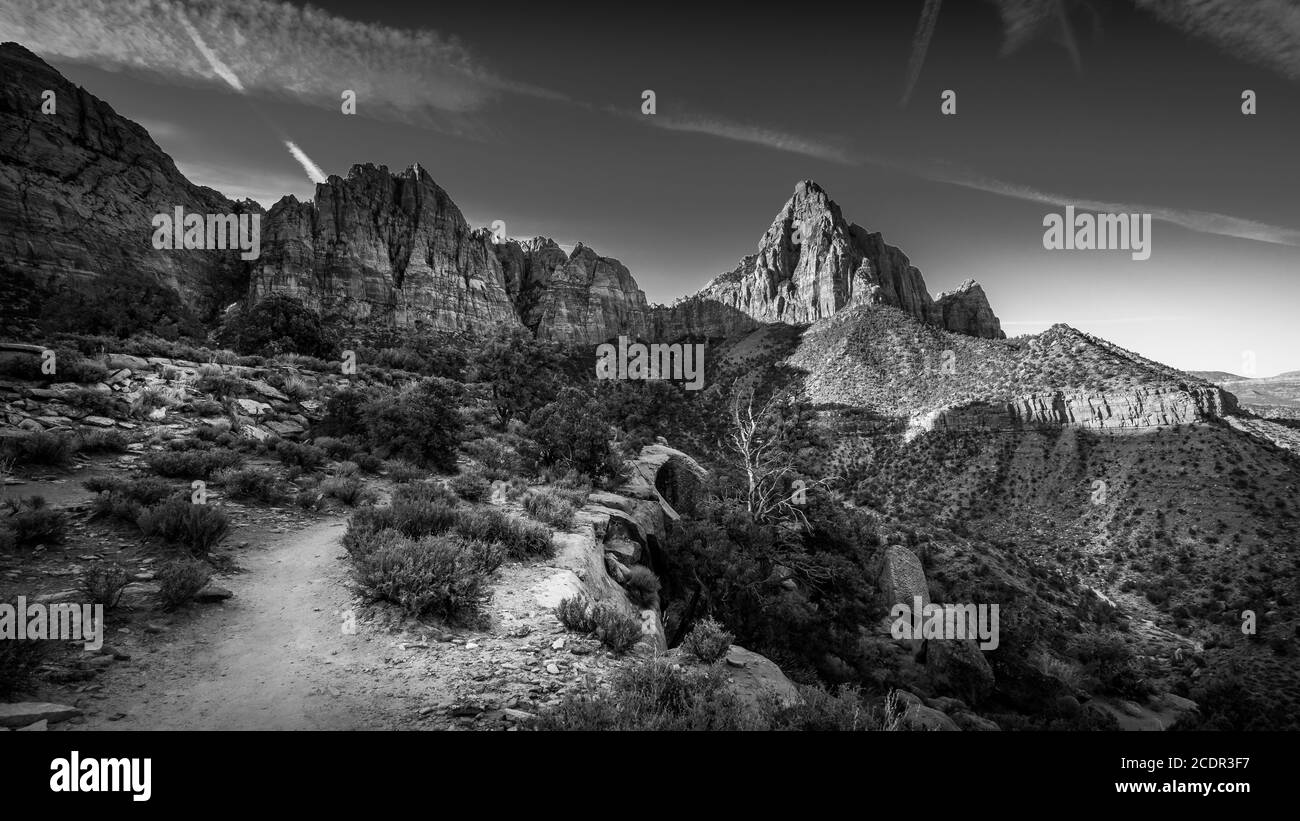 Black and White Photo of reaching the end destination of the Watchman Hiking Trail in Zion National Park in Utah, USA during a sunrise hike Stock Photo