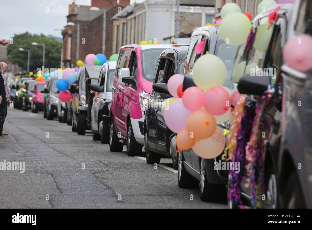 Troon, Ayrshire Scotland, 19 June 2019.The annual Glasgow Taxi Parade in Troon when cabbies bring less privilaged children & familes to the seaside town Credit : Alister Firth Stock Photo