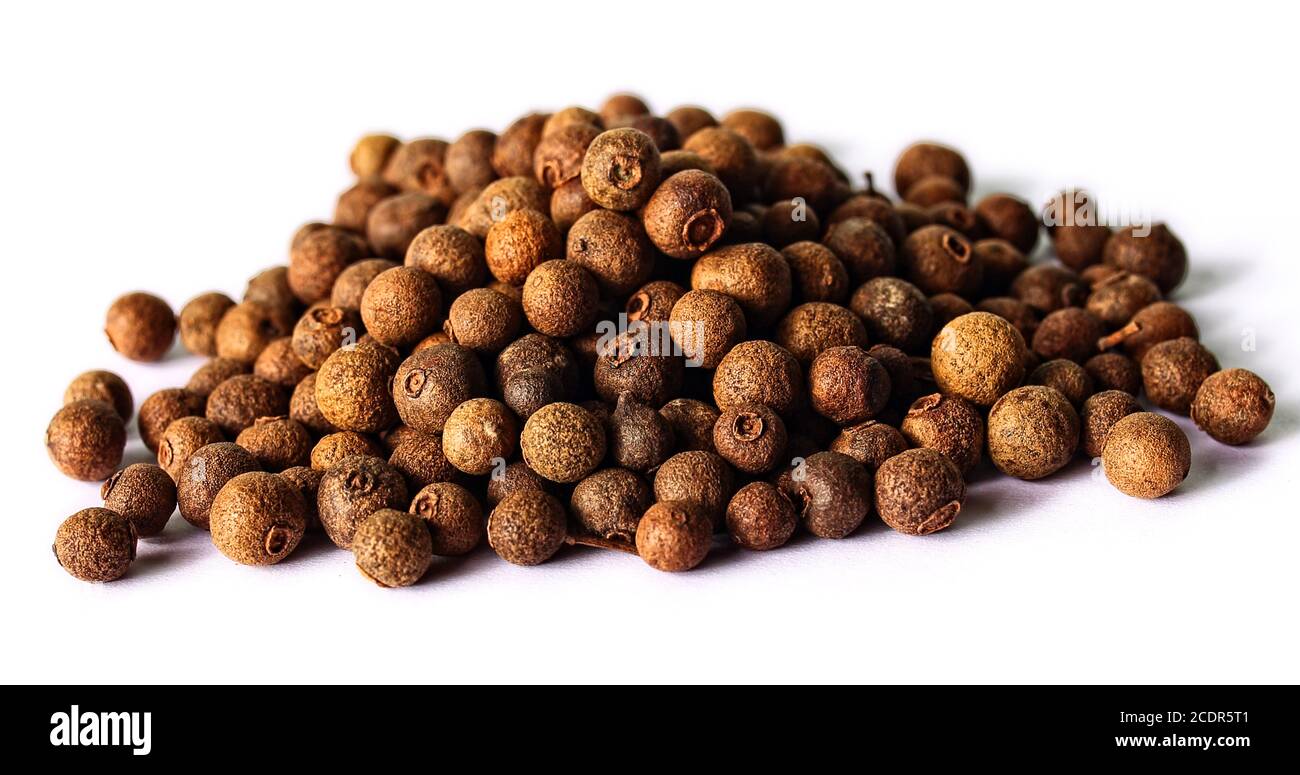 allspice spice on white background Stock Photo Alamy
