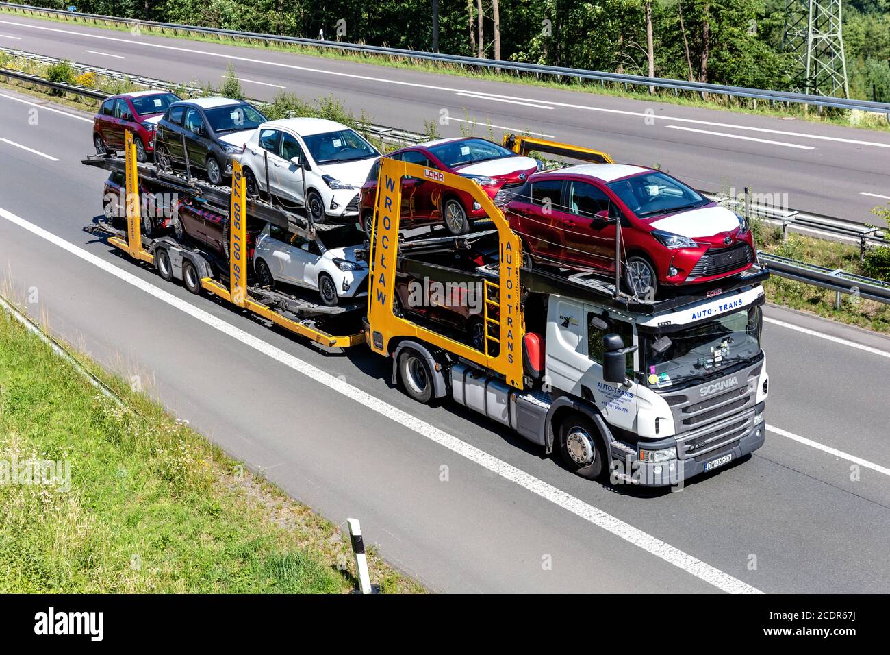 Auto-Trans Scania P410 car-carrying truck on motorway Stock Photo - Alamy