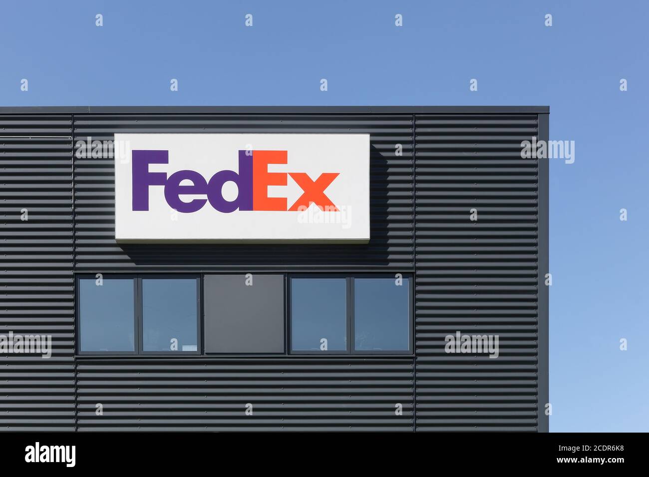 Odense, Denmark - April 9, 2017: FedEx building and warehouse. FedEx Corporation is an American global courier delivery services company Stock Photo