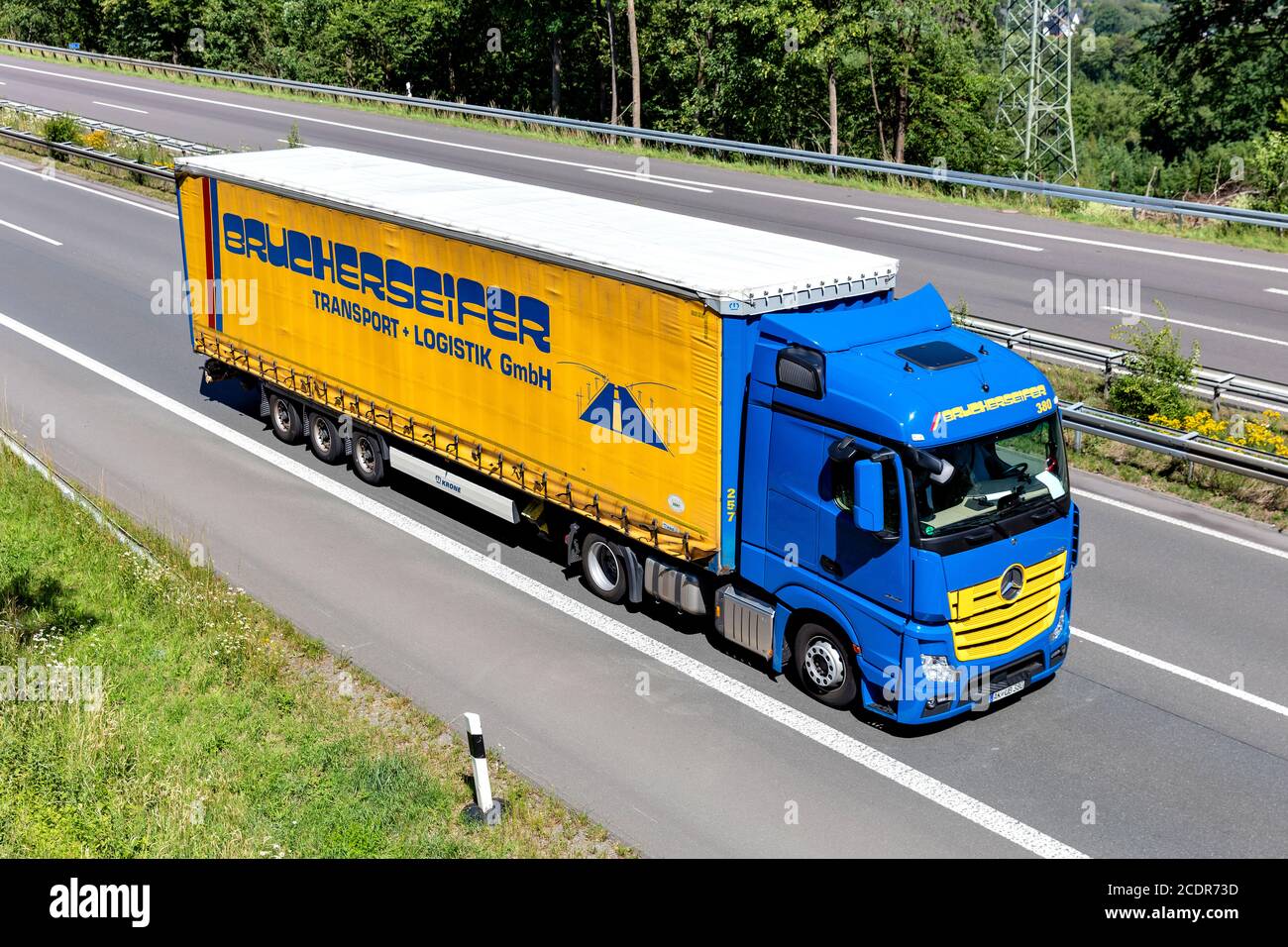 DAF XF truck with Dachser curtainside trailer on motorway Stock Photo -  Alamy