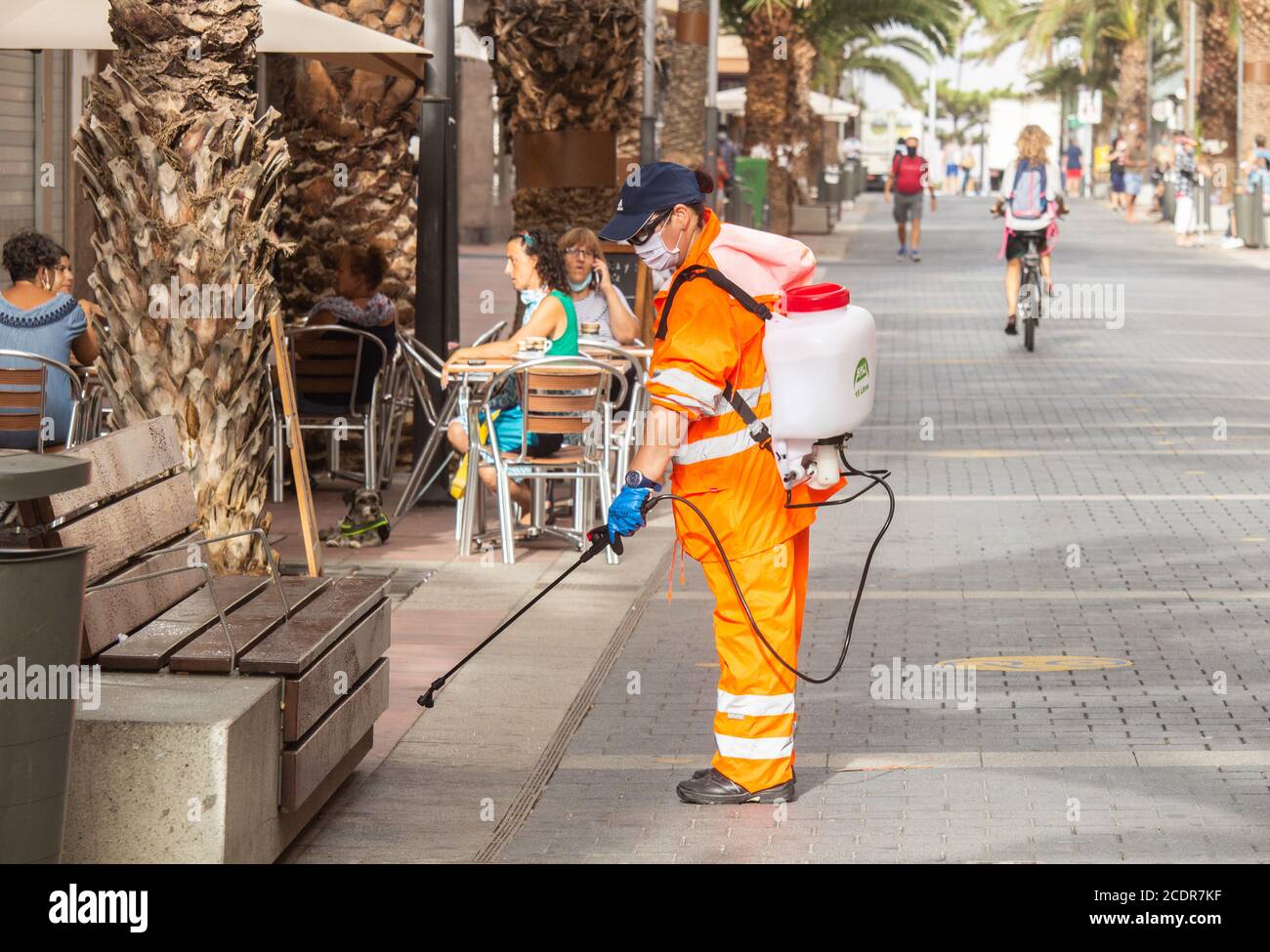 Las Palmas, Gran Canaria, Canary Islands, Spain. 28th August, 2020. Workers disinfecting benches in  Las Palmas on Gran Canaria. The Canary Islands have seen a huge spike in Coronavirus infections in August, with Las Palmas registering the most cases. Credit: Alan Dawson/Alamy Live News Stock Photo