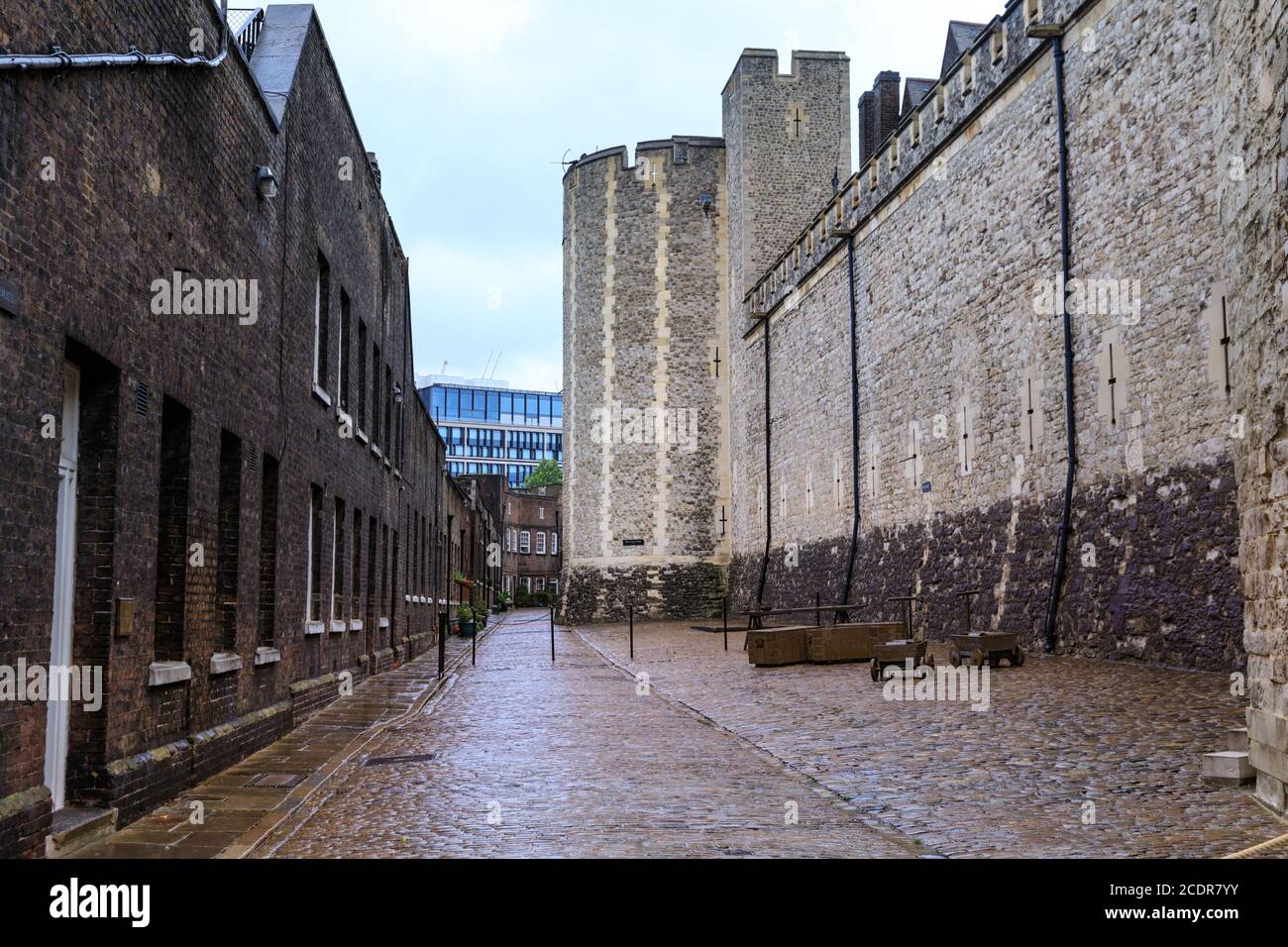 Tower of London buildings and alley, Her Majesty's Royal Palace and Fortress of the Tower of London, historic castle on the River Thames, London, UK Stock Photo