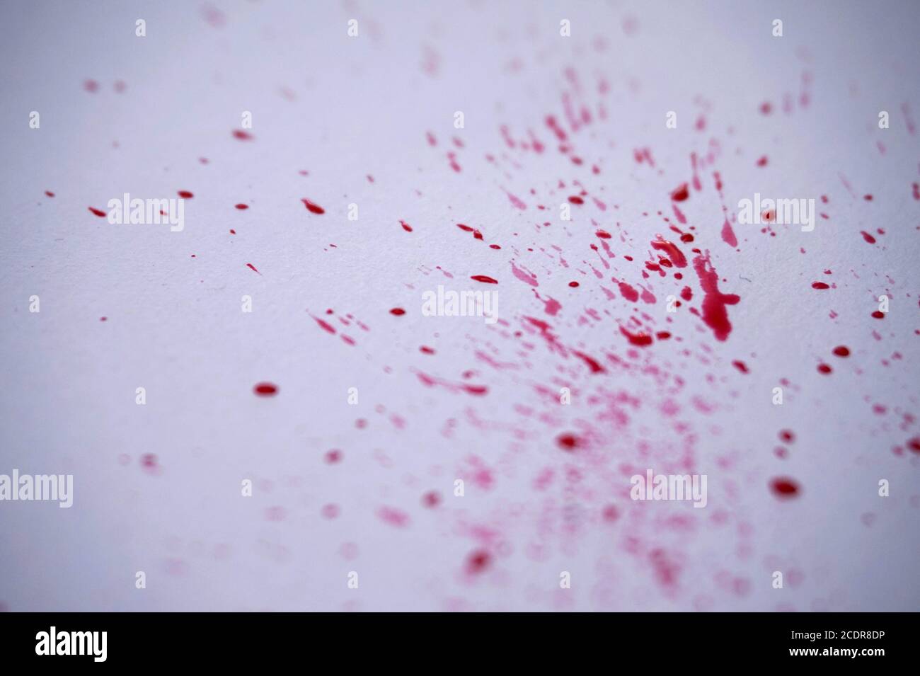 Red paint splatter Stock Photo