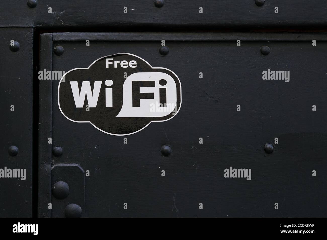 Reference to free Wi-Fi at the door of a restaurant in Prague Stock Photo