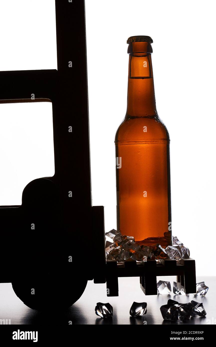 Pallet carrier with chilled brown beer bottle Stock Photo