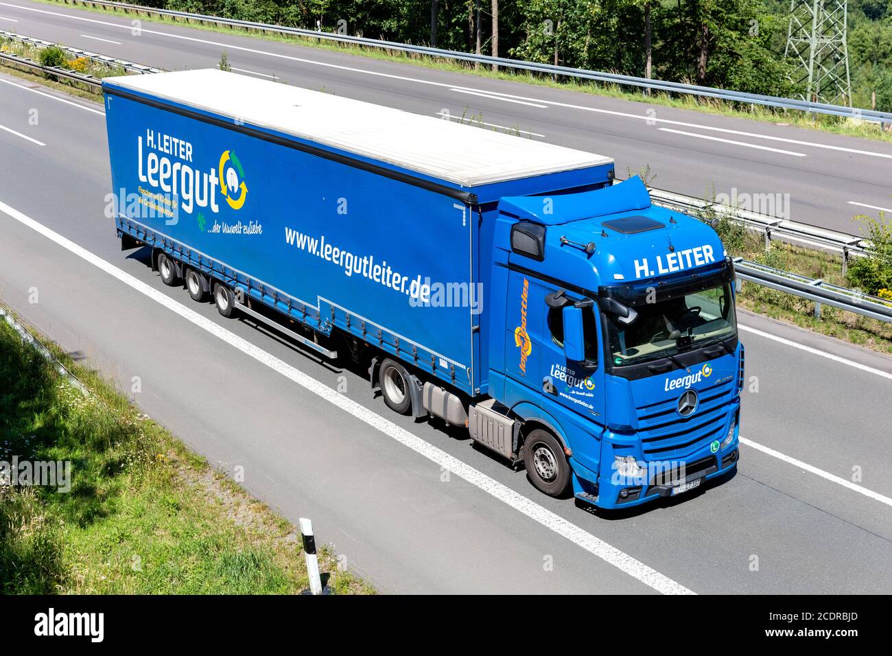 Leiter Leergut Mercedes-Benz Actros truck with curtainside trailer on  motorway Stock Photo - Alamy