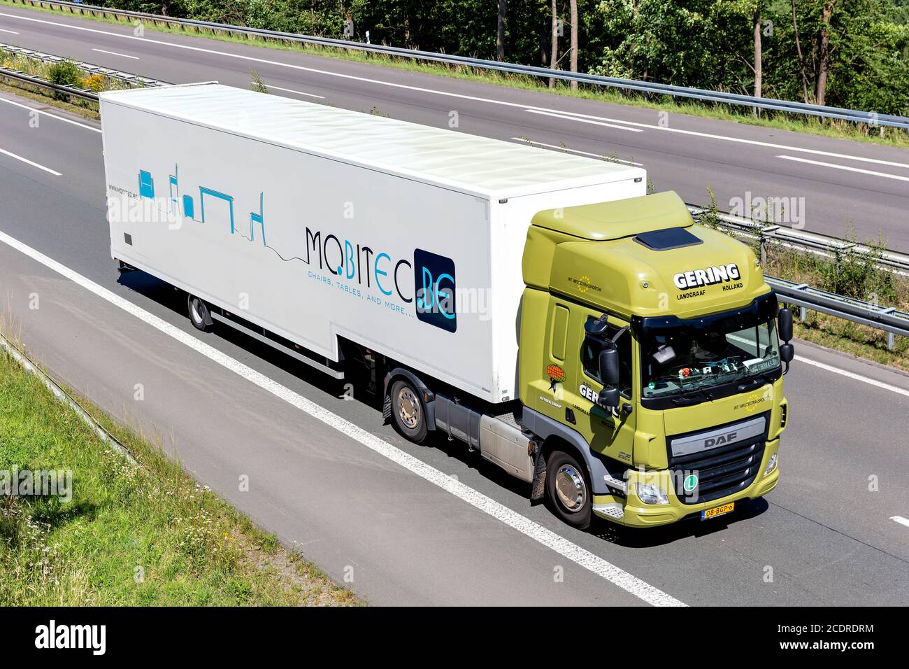 Gering DAF CF truck with Mobitec box trailer on motorway. Stock Photo