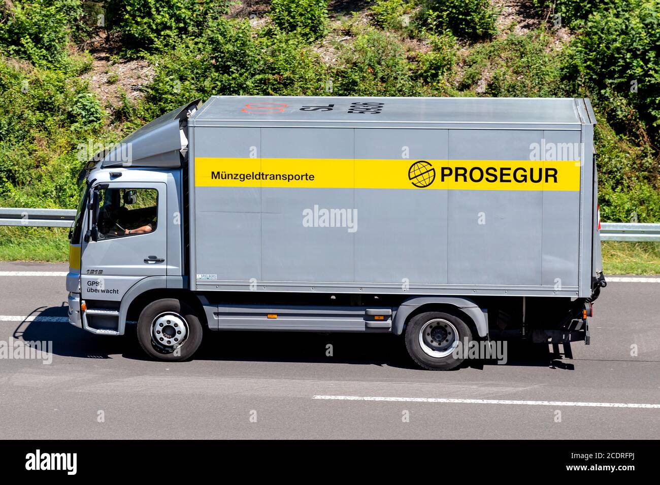 Prosegur Mercedes-Benz Atego coinage transporter on motorway. Stock Photo