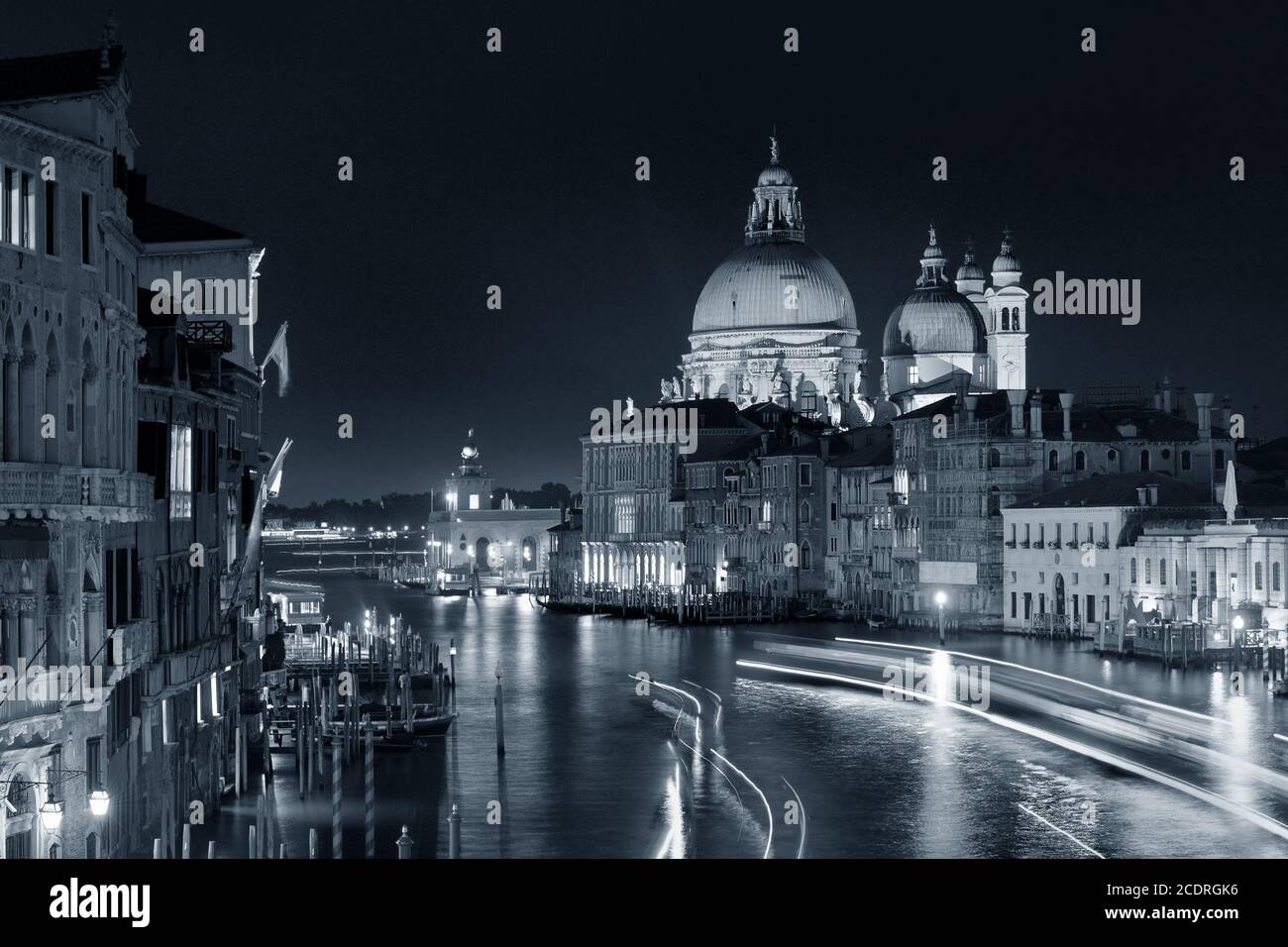 Busy Venice Grand Canal with light trails at night, Italy. Stock Photo