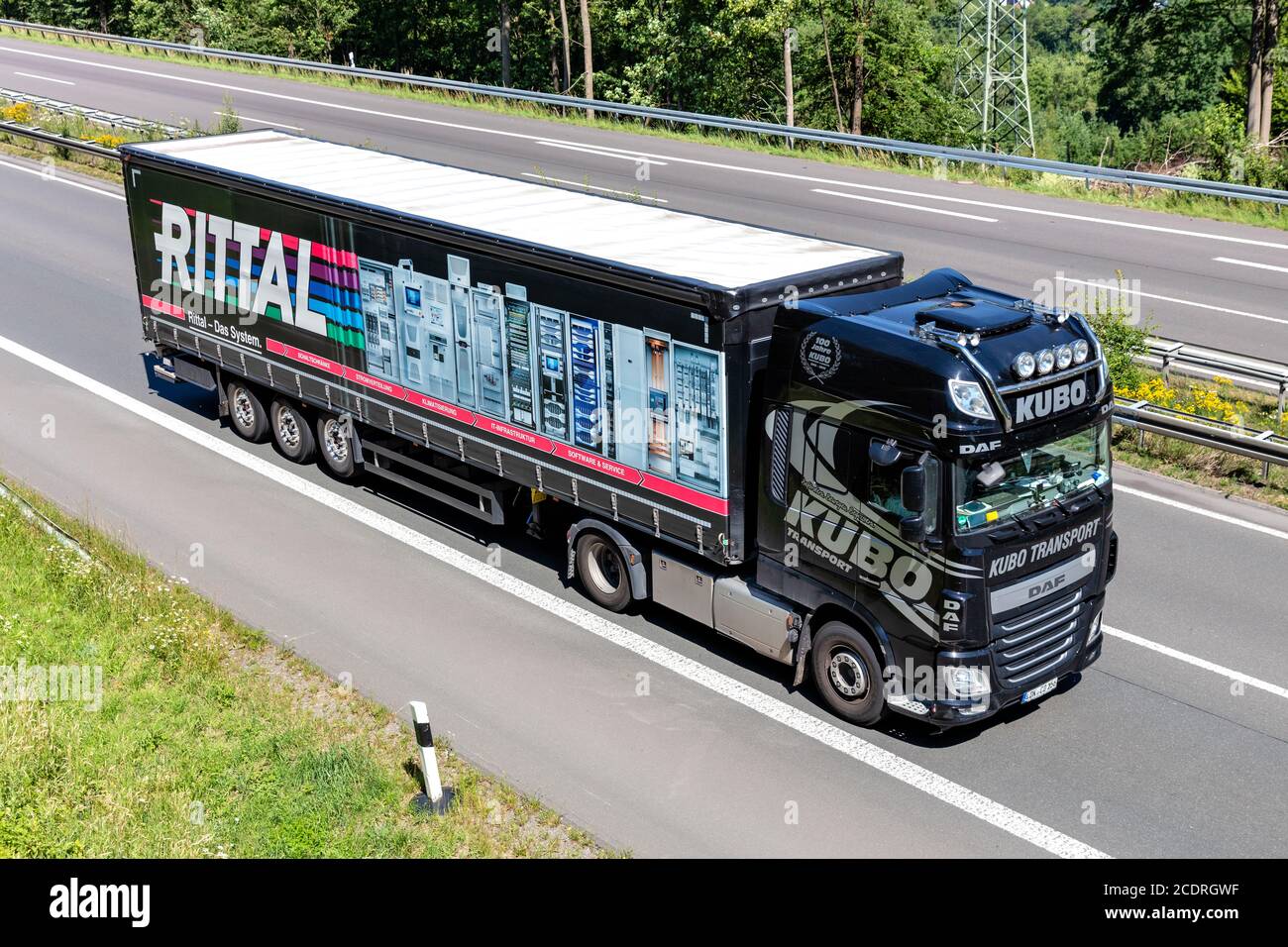 DAF XF truck with Dachser curtainside trailer on motorway Stock Photo -  Alamy