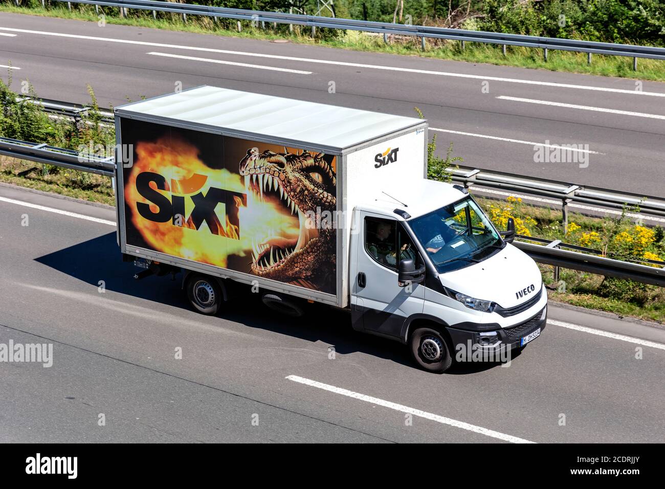Sixt Iveco Daily on motorway. Sixt SE is a European multinational car
