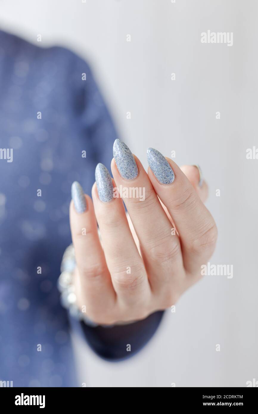Female Hand With Long Nails And Light Blue Manicure With Bottles Of Nail Polish Stock Photo Alamy Female Hand With Long Nails And Light Blue Manicure With Bottles Of Nail Polish Stock Photo Alamy