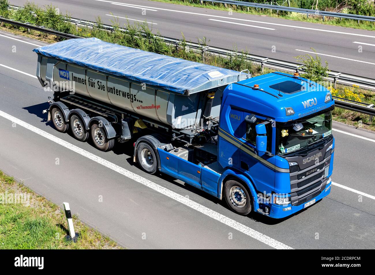 WGU Scania R500 truck with tipper trailer on motorway. Stock Photo