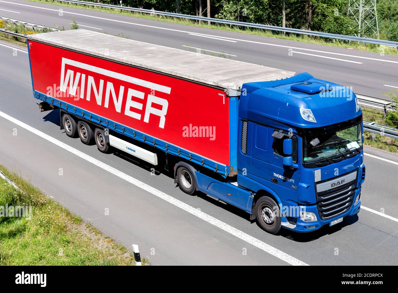 DAF XF truck with Dachser curtainside trailer on motorway Stock Photo -  Alamy