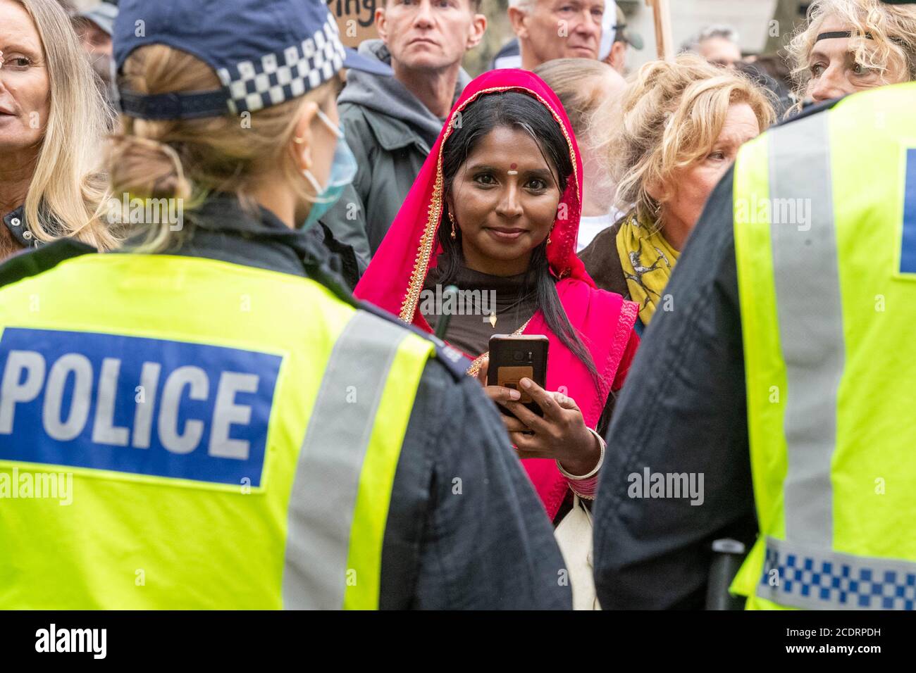 London, UK. 29th Aug, 2020. A large police presence guarded Downing Street from the large anti vaxx protest that marched from Trafalgar Square London UK Credit: Ian Davidson/Alamy Live News Stock Photo