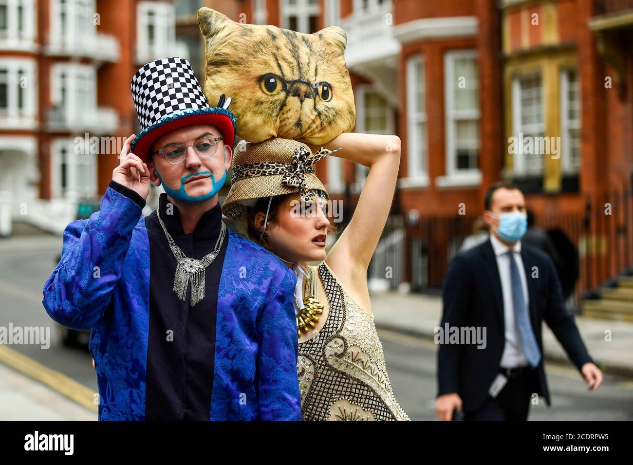 London, UK. 29 August 2020. Models take part in a flashmob fashion show in Sloane Street, Knightsbridge, for designer Pierre Garroudi. Credit: Stephen Chung / Alamy Live News Stock Photo