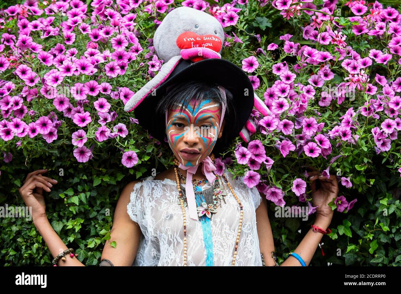 London, UK. 29 August 2020. Models take part in a flashmob fashion show in Sloane Street, Knightsbridge, for designer Pierre Garroudi. Credit: Stephen Chung / Alamy Live News Stock Photo
