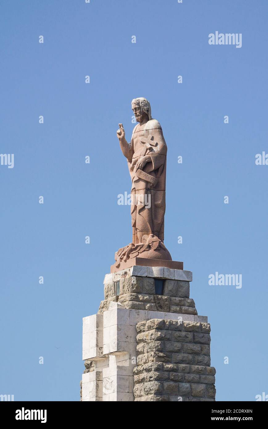 Jesus Christus statue at the port entrance in Tarifa, Sagrado Corazon de Jesus, jesus christ statue, Costa de la Luz, Andalucia, Spain. Stock Photo