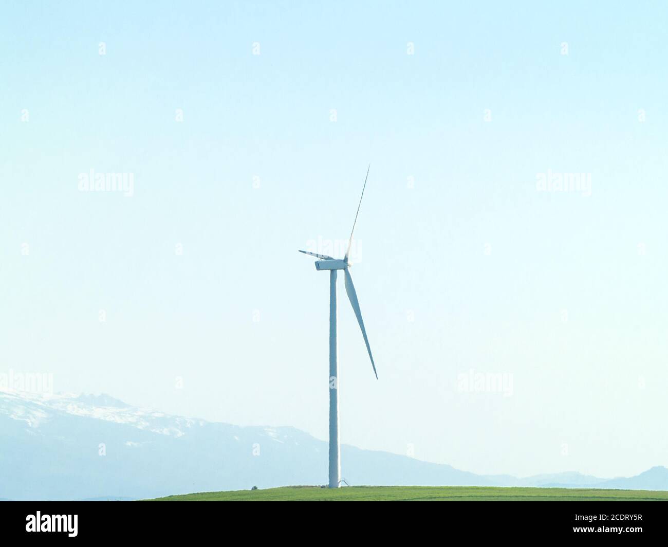 Windmill on countryside generating wind energy Stock Photo