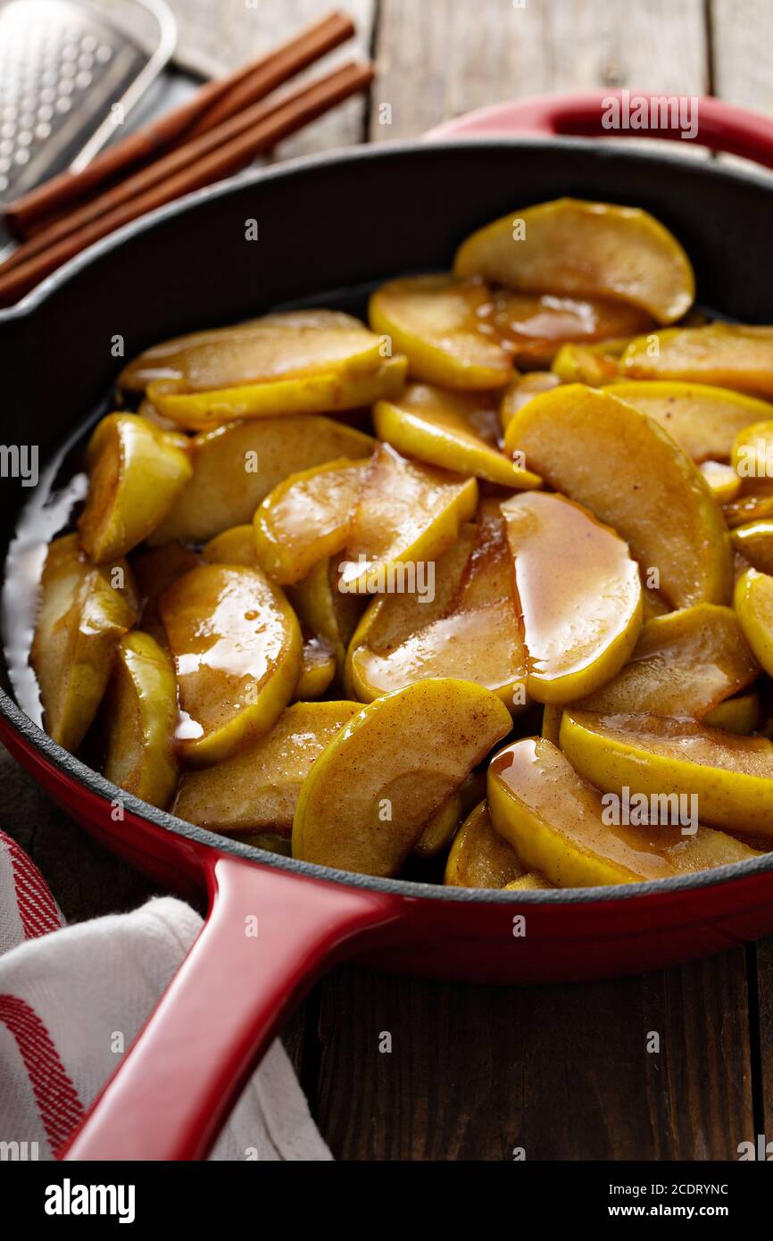 Fried apples in a cast iron skillet Stock Photo