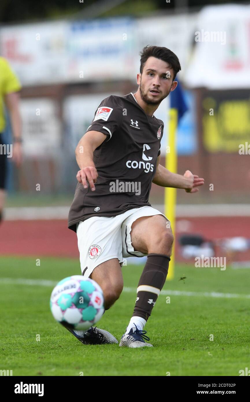 Lohne, Germany. 29th Aug, 2020. Football: Test matches: SV Werder Bremen - FC St.Pauli. St. Paulis Leon Flat on the ball. Credit: Carmen Jaspersen/dpa - IMPORTANT NOTE: In accordance with the regulations of the DFL Deutsche Fußball Liga and the DFB Deutscher Fußball-Bund, it is prohibited to exploit or have exploited in the stadium and/or from the game taken photographs in the form of sequence images and/or video-like photo series./dpa/Alamy Live News Stock Photo