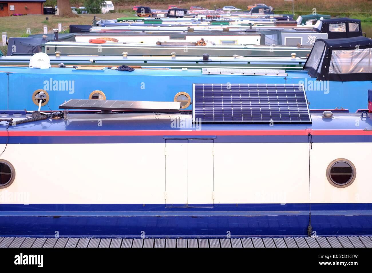 Solar panels on roof of canal narrow boat providing off grid power