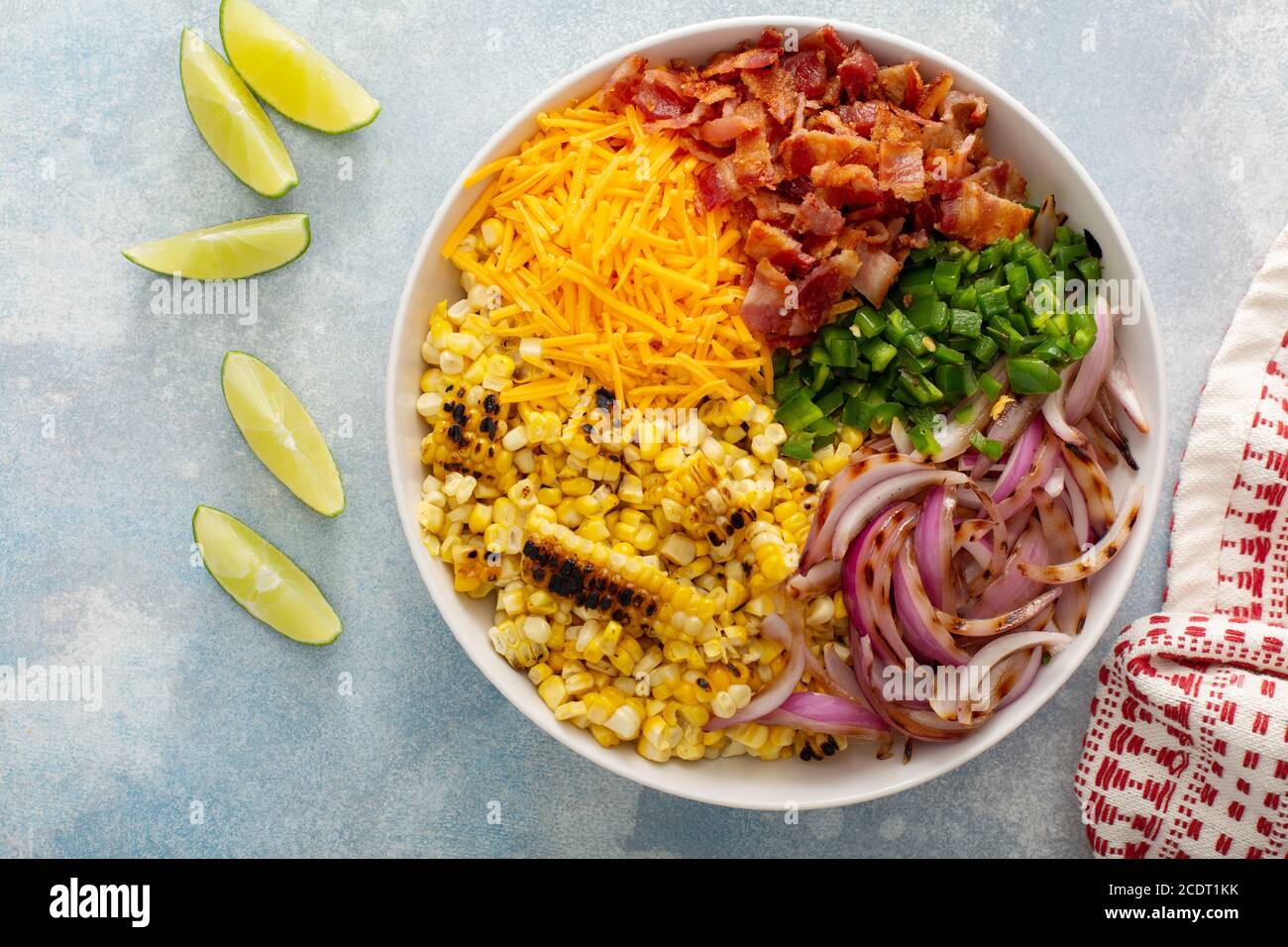 Grilled corn and jalapeno salad with cheese and bacon Stock Photo Alamy