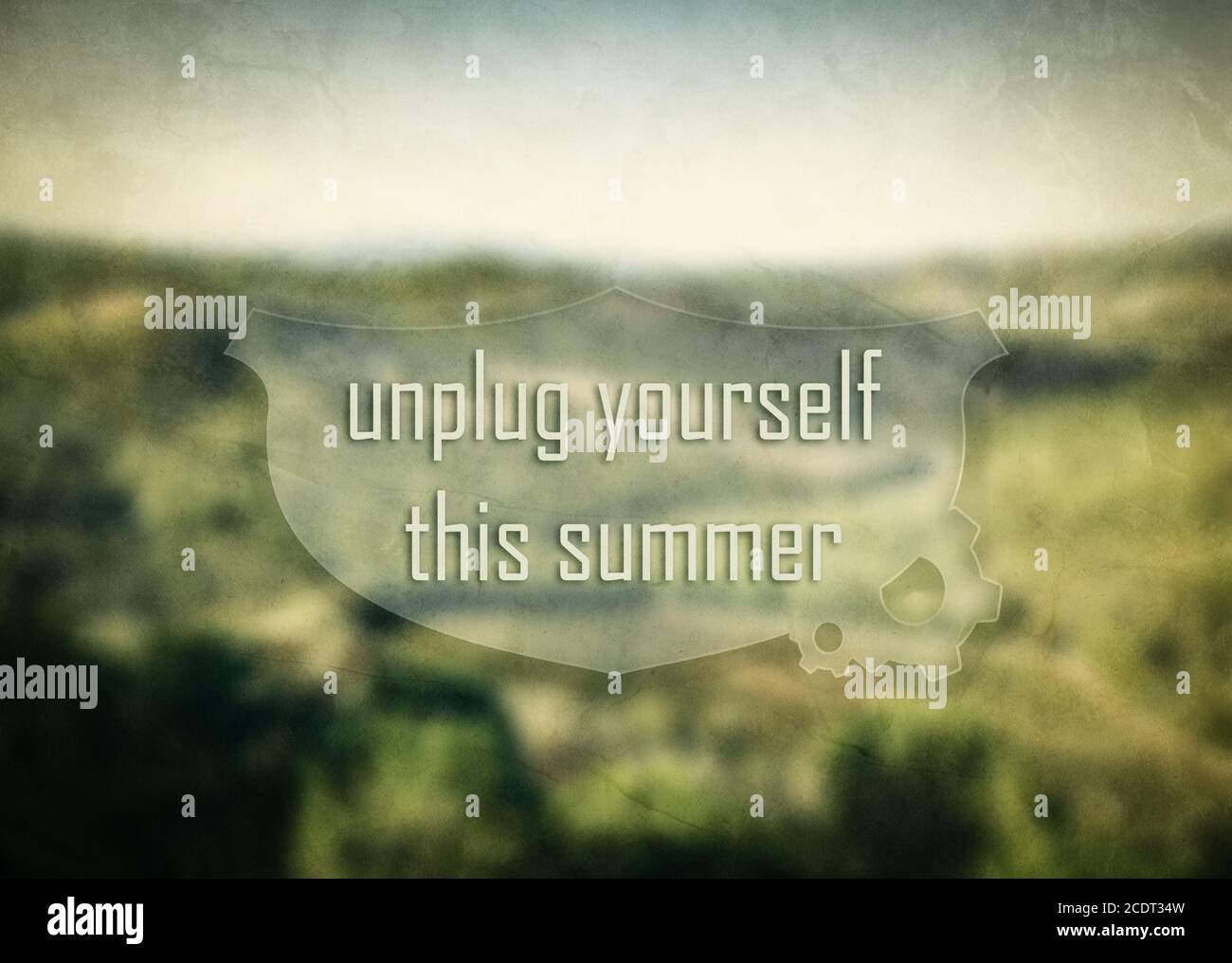 quot;Unplug yourself this summerquot; inspirational, motivational message on nature blurred background Stock Photo