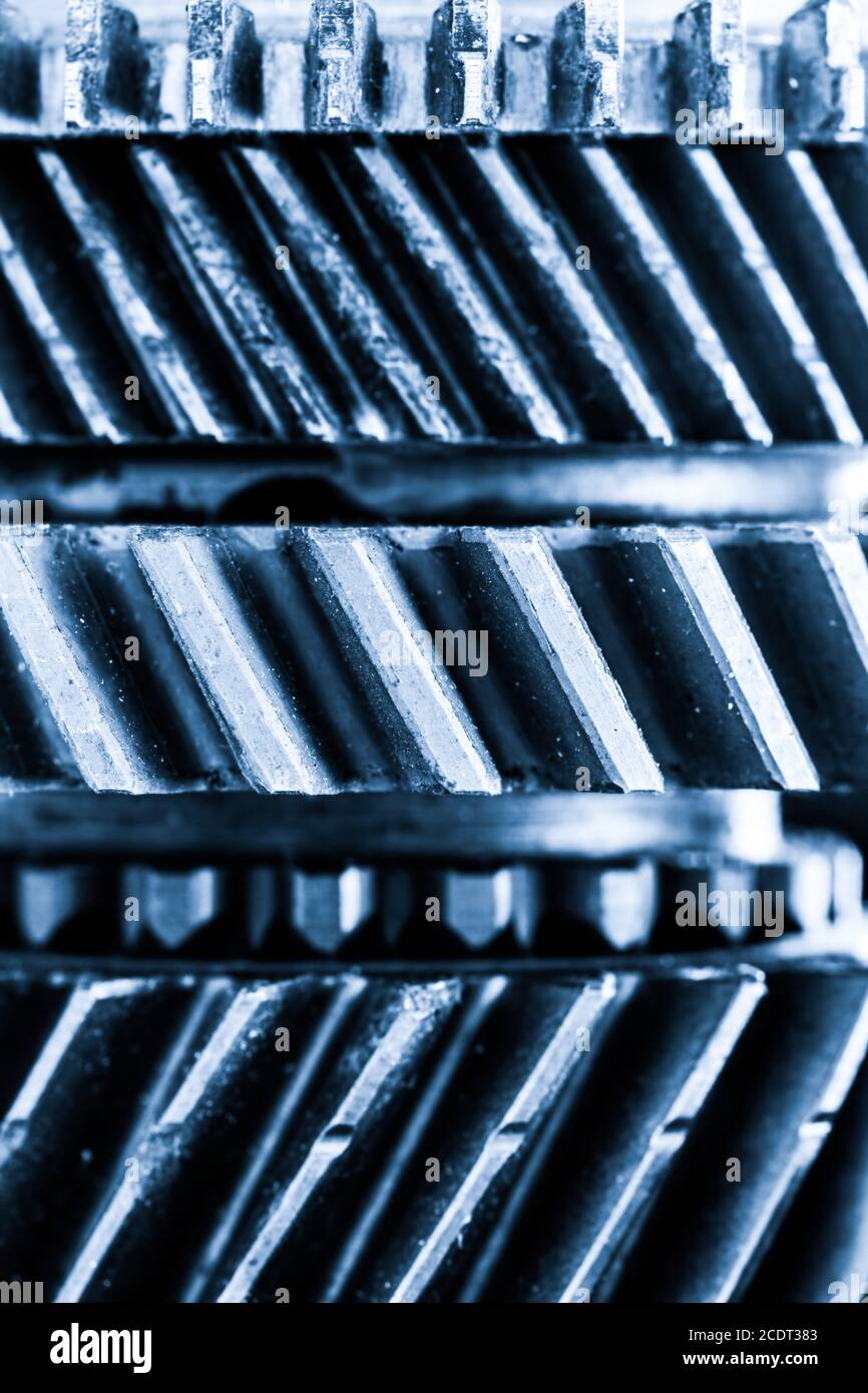 Gears, grunge cogwheels, real engine elements background. Heavy industry Stock Photo