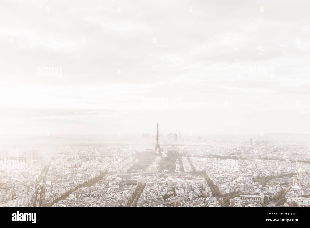 Paris, France skyline in misty fog. Eiffel Tower foggy, unique view. Stock Photo