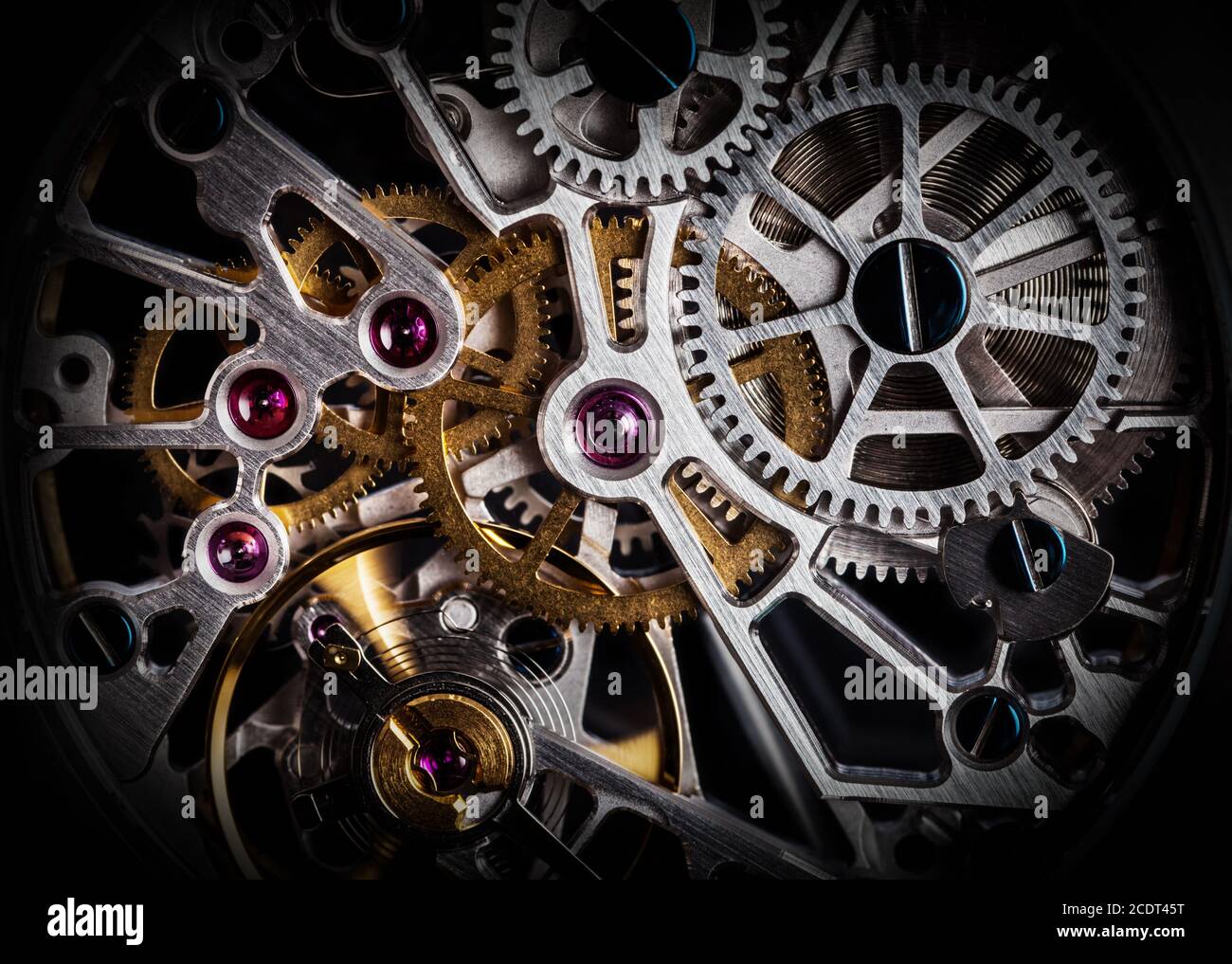 Mechanism, clockwork of a watch with jewels, closeup. Vintage luxury