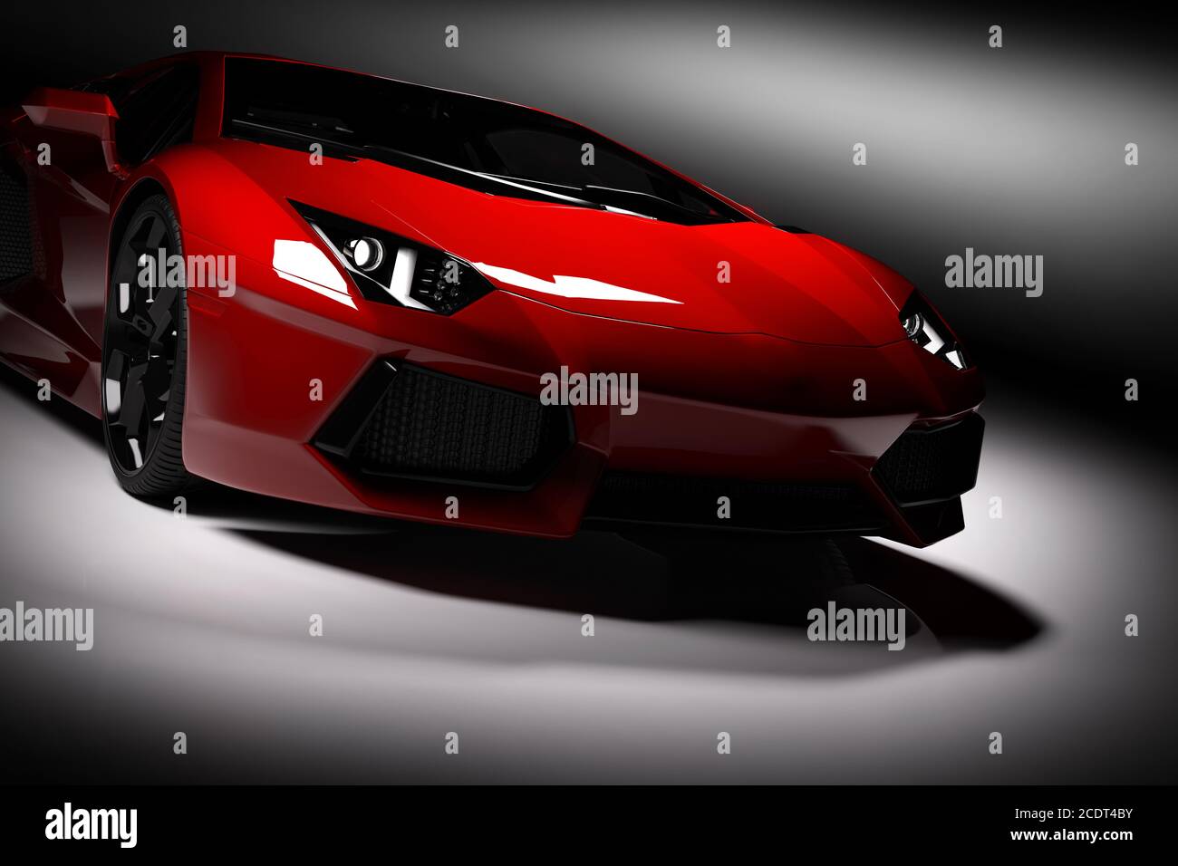 Red fast sports car in spotlight, black background. Shiny, new, luxurious. Stock Photo