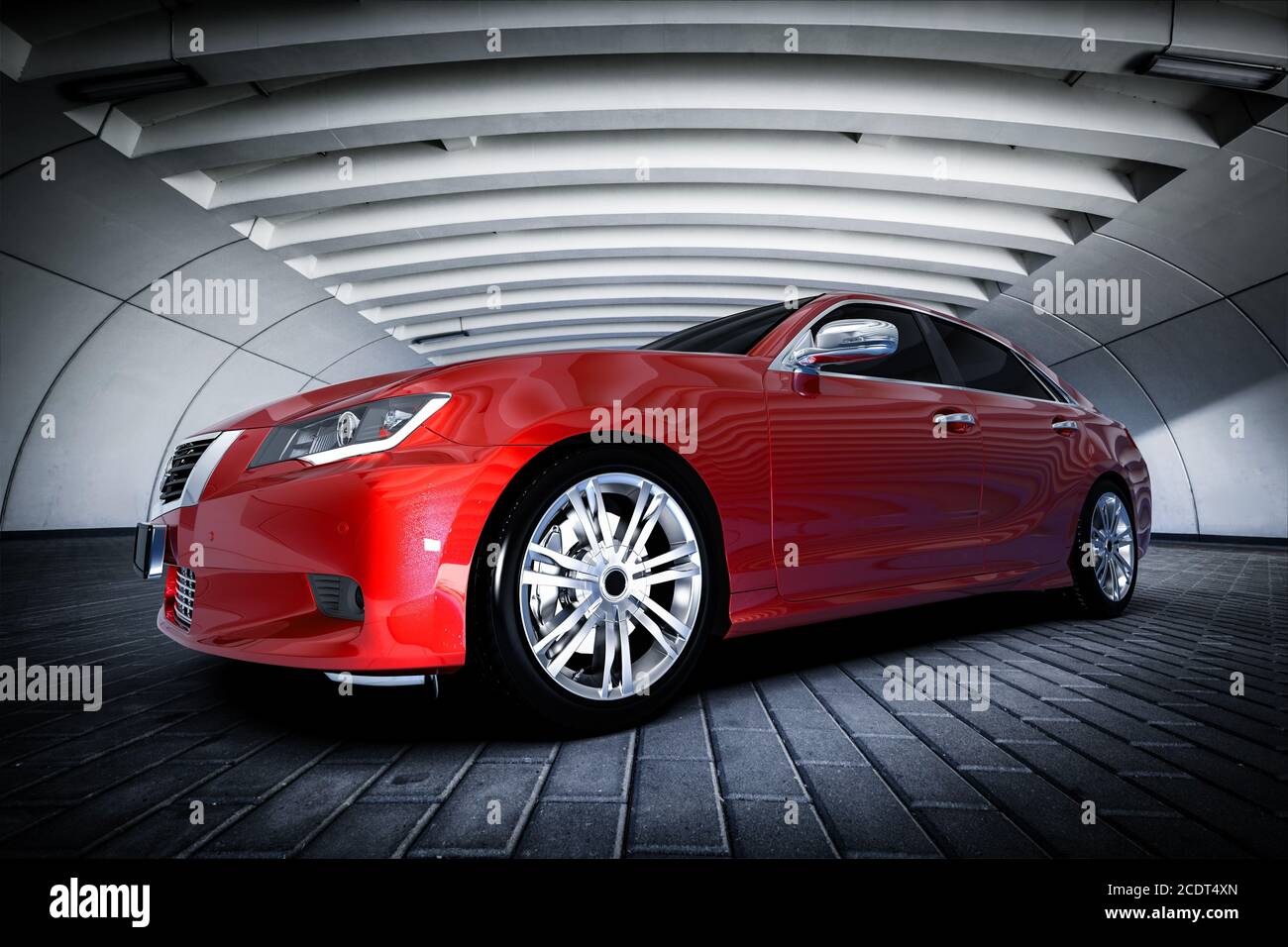 Modern red metallic sedan car in urban setting - tunnel. Generic design, brandless Stock Photo