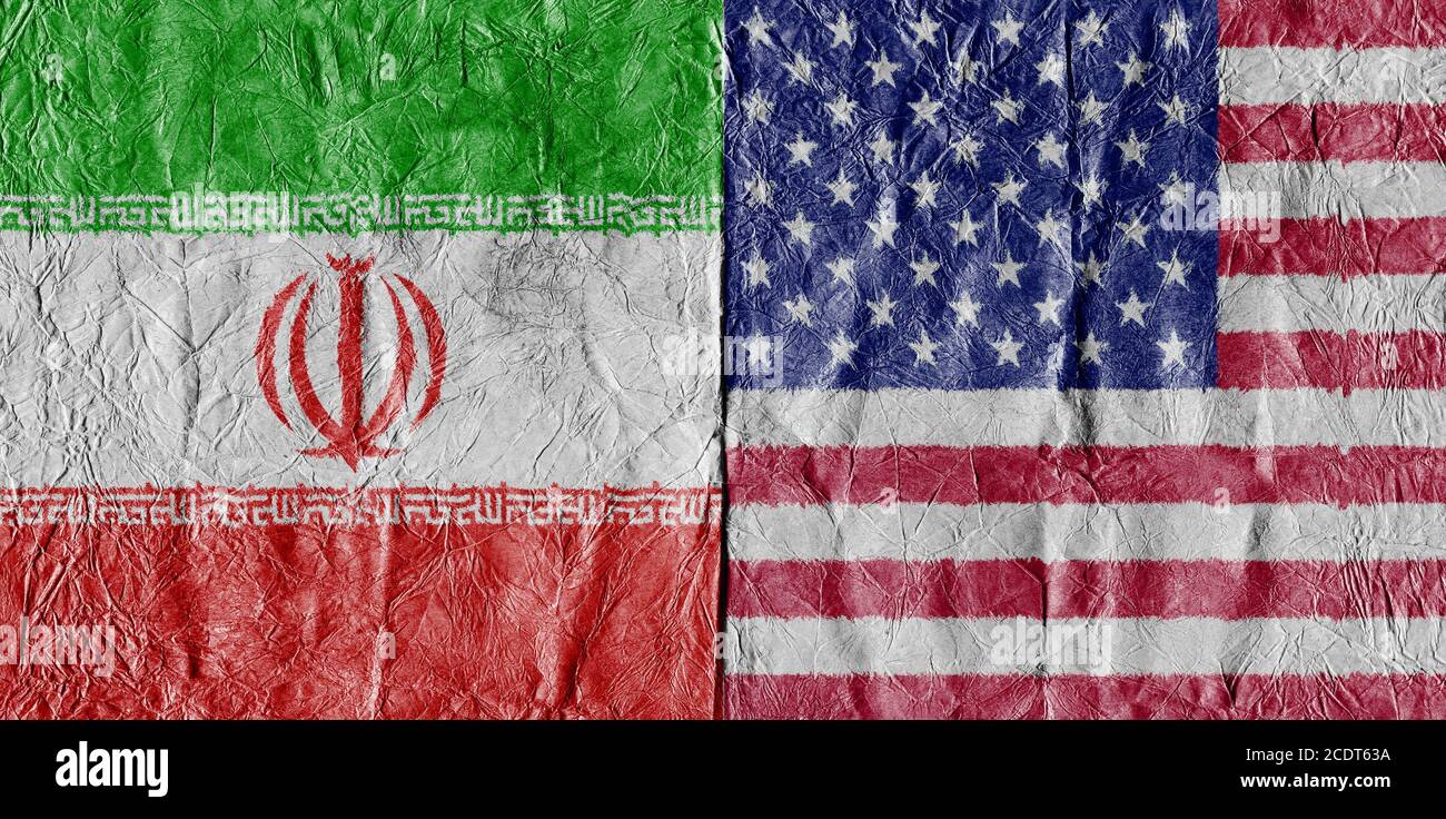 USA flag and Iran Flag on a paper in close-up Stock Photo