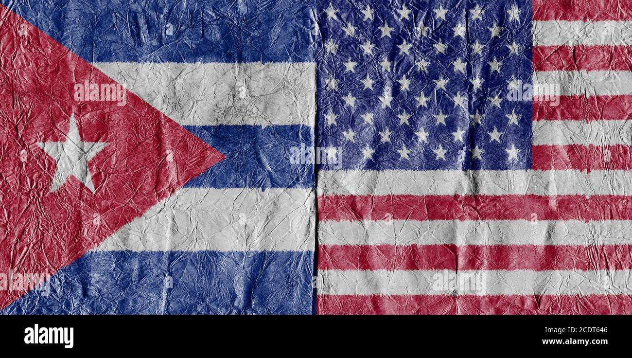 USA flag and Cuba Flag on a paper in close-up Stock Photo
