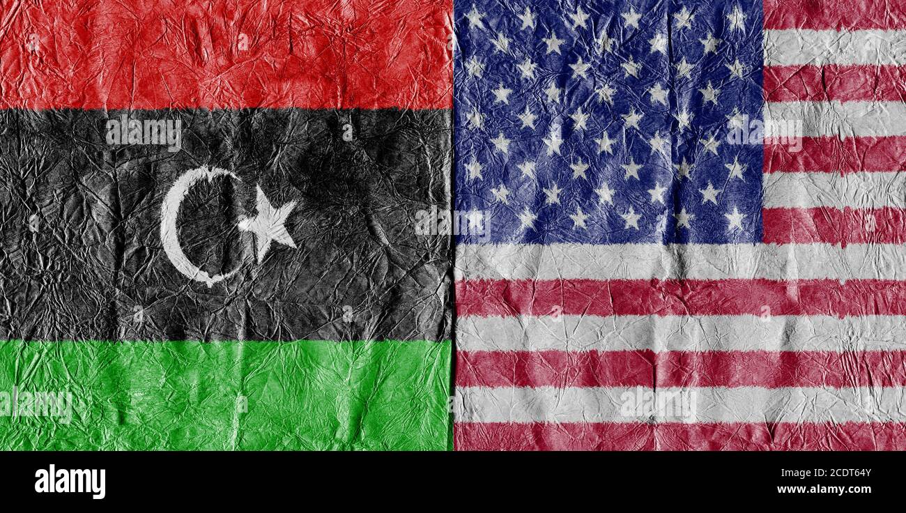 USA flag and Libya Flag on a paper in close-up Stock Photo