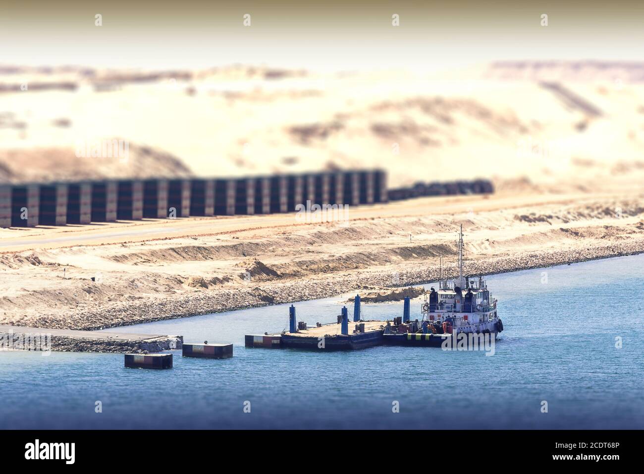Construction work with work ship in the new extension channel of the Suez Canal Stock Photo