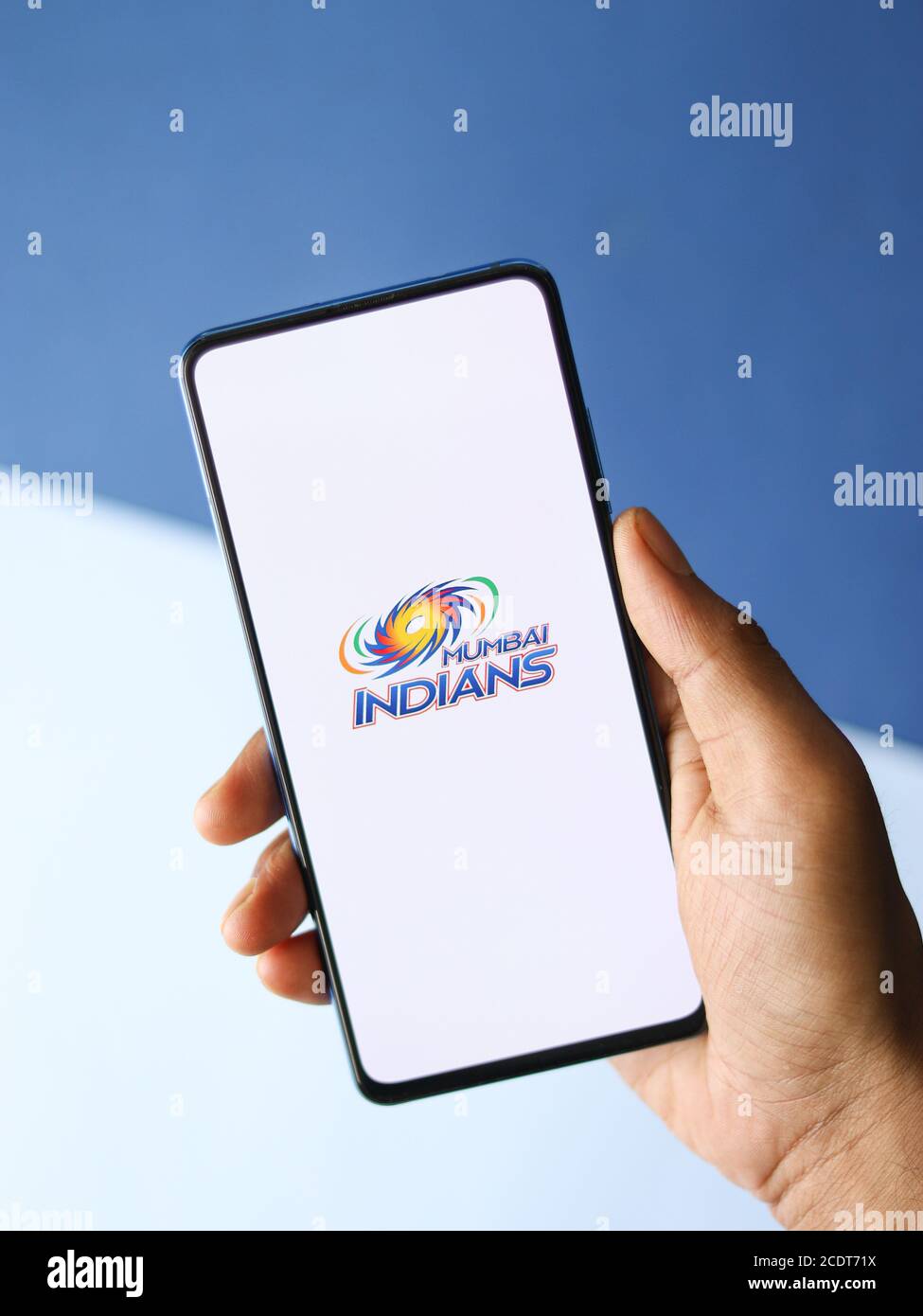 Assam, india - August 27, 2020 : Mumbai Indians logo on phone screen stock image. Stock Photo