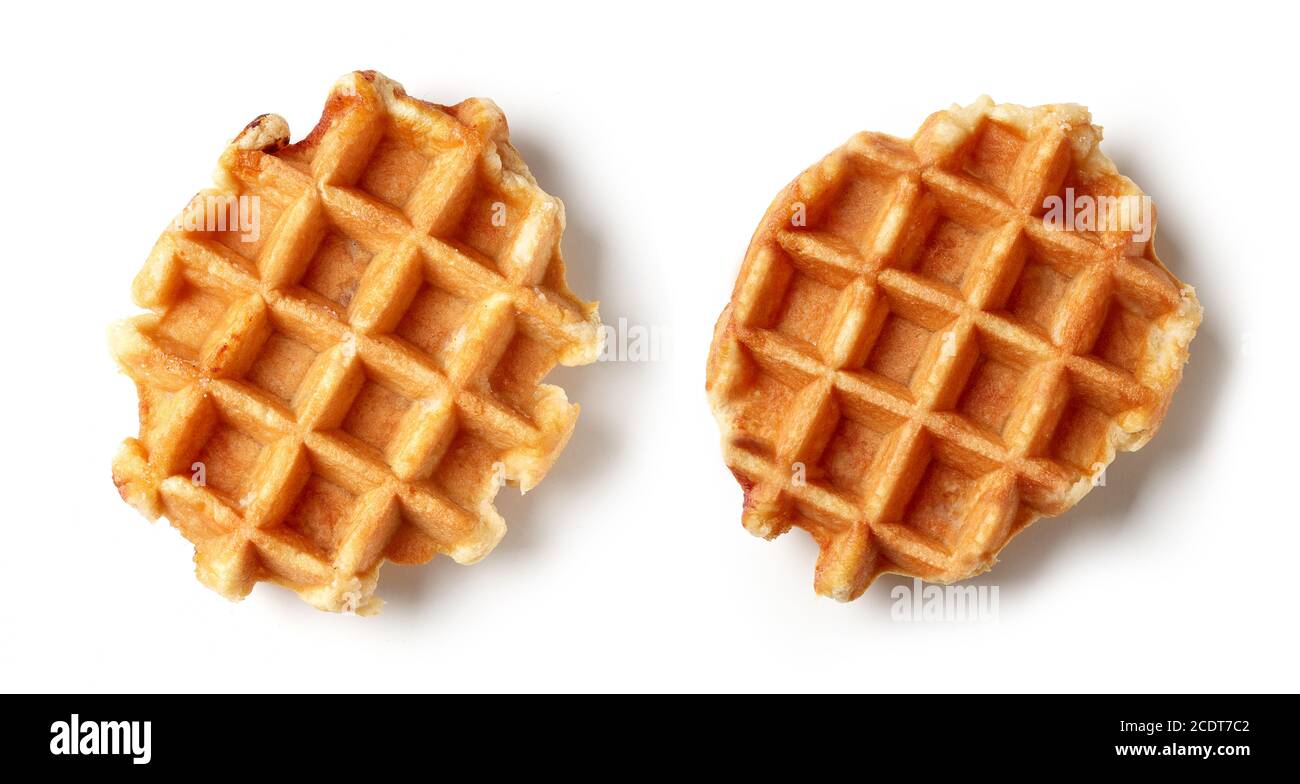 two freshly baked belgian waffles isolated on white background, top view Stock Photo